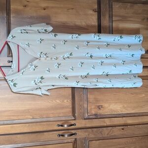 Tan floral kyte baby dress.